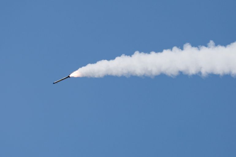 An Iron Dome anti-missile system fires an interceptor missile as a rocket is launched from the Gaza Strip towards Israel