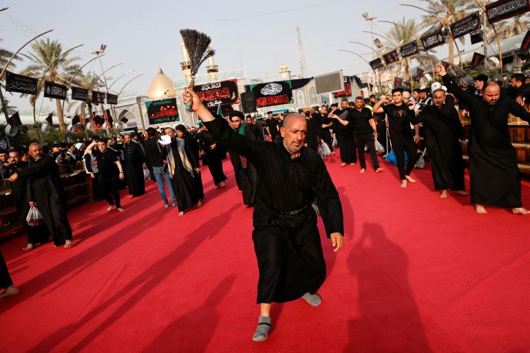 Shi'ite pilgrims flagellate themselves ahead of Ashura, the holiest day on the Shi'ite Muslim calendar in the holy city of Kerbala, Iraq