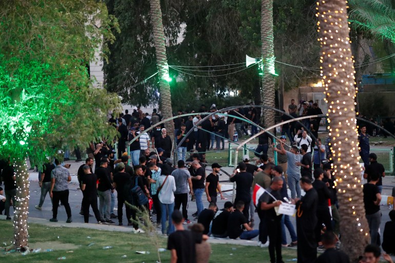 Supporters of the Coordination Framework, a group of Shi'ite parties, protest in Baghdad