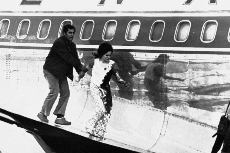 bloodstained Theresa Halsa leaves the plane on 9 May 1972. Photograph: AP