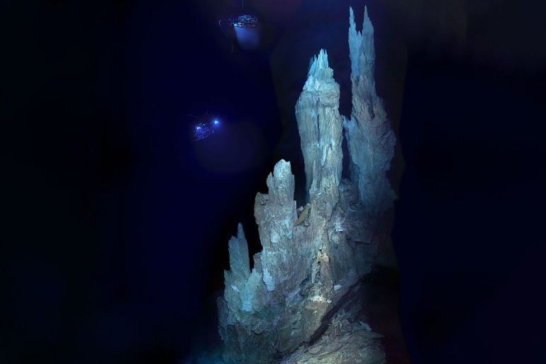 Carbonate structures at a hydrothermal vent in the ocean today include these spires stretching 90 feet tall. The white, sinuous spine is freshly deposited carbonate material. (Image credit: Kelley, University of Washington, IFE, URI-IAO, NOAA)