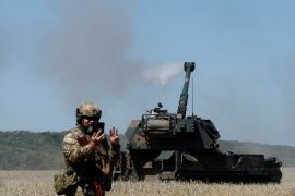 Ukrainian servicemen fire towards Russian troops on self-propelled AHS Krab howitzer, as Russia's attack in Ukraine continues, in Donetsk region