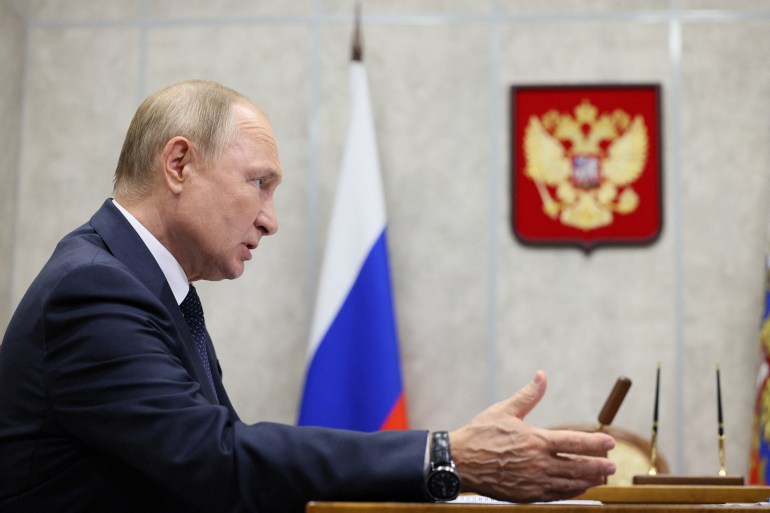 Russian President Vladimir Putin attends a meeting with Governor of the Novgorod region Andrei Nikitin in the city of Veliky Novgorod, Russia, September 21, 2022. Sputnik/Gavriil Grigorov/Pool via REUTERS ATTENTION EDITORS - THIS IMAGE WAS PROVIDED BY A THIRD PARTY.