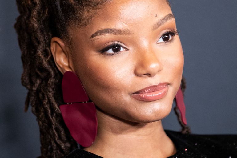 epa07706729 US singer Halle Bailey poses on the red carpet prior to the world premiere of 'The Lion King' at the Dolby Theater in Hollywood, California, USA, 09 July 2019. The film will be released in US theaters on 19 July. EPA-EFE/ETIENNE LAURENT