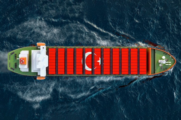 Freighter ship with Turkish cargo containers sailing in ocean, 3D rendering shutterstock_1827044534