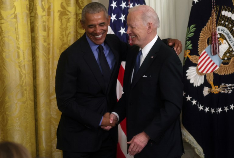 U.S. President Joe Biden and former U.S. President Barack Obama embrace after they spoke about the Affordable Care Act and Medicaid at the White House in Washington, U.S., April 5, 2022. REUTERS/Leah Millis