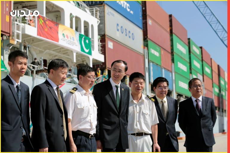 Chinese Ambassador to Pakistan, Sun Weidong (C), poses for pictures with members of his staff and crew of the first container ship to depart after the inauguration of the China Pakistan Economic Corridor port in Gwadar, Pakistan November 13, 2016. REUTERS/Caren Firouz