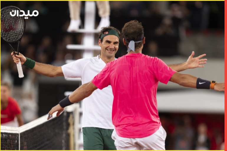 epaselect epa08201226 Roger Federer of Switzerland (L) embraces Rafael Nadal from Spain (R) after winning the Match in Africa Cape Town charity event, Cape Town, South Africa 07 February 2020. Presented by Rolex the Match in Africa is for the benefit of the Roger Federer foundation. EPA-EFE/NIC BOTHMA