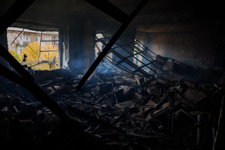 This photograph taken on October 27, 2022, shows a view of a destroyed apartment after shelling in the frontline town of Bakhmut, in eastern Ukraine's Donetsk region, amid Russia's invasion of Ukraine. - The eastern Ukraine town, known for its salt mines and vineyards, has been under attack for months by Russian forces, who are mostly on the defensive in other regions across Ukraine. (Photo by Dimitar DILKOFF / AFP)