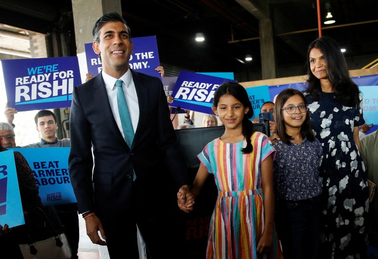 Conservative leadership candidate Rishi Sunak, his wife Akshata Murthy and his daughters Anoushka and Krishna attend a Conservative Party leadership campaign event in Grantham, Britain, July 23, 2022. REUTERS/Peter Nicholls