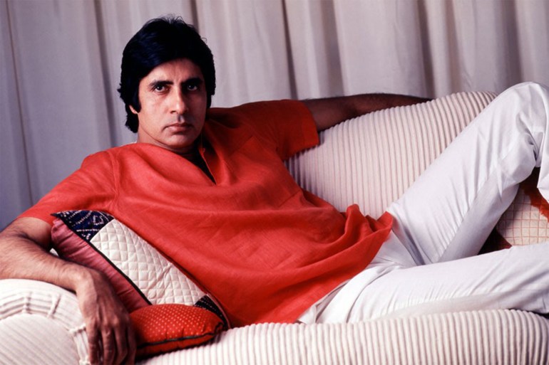 gettyimages-499341579 Amitabh Bachchan 1987, India, Portrait of Amitabh Bachchan sitting on sofa. (Photo by Dinodia Photos/Getty Images)