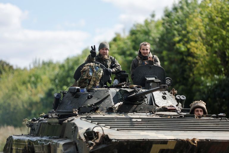 Ukrainian servicemen drive out of Bakhmut, Donetsk region