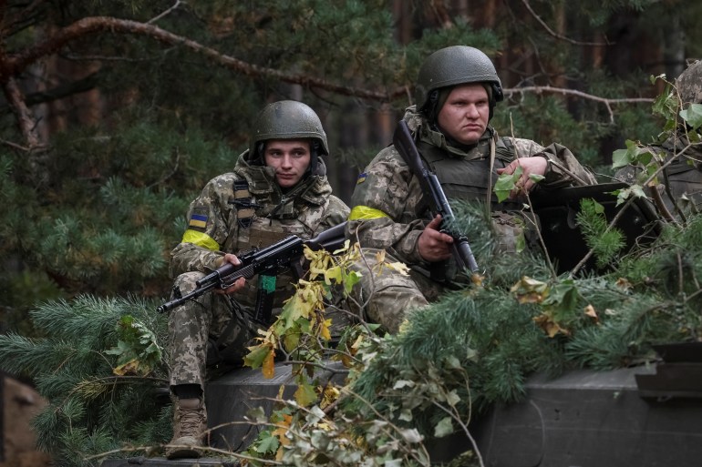 Ukrainian servicemen attend a joint drills at the border with Belarus