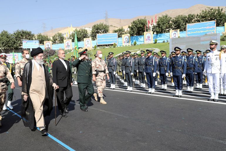 Iran's Supreme Leader Ayatollah Ali Khamenei reviews armed forces during a graduation ceremony for armed Forces Officers' Universities at the police academy in Tehran