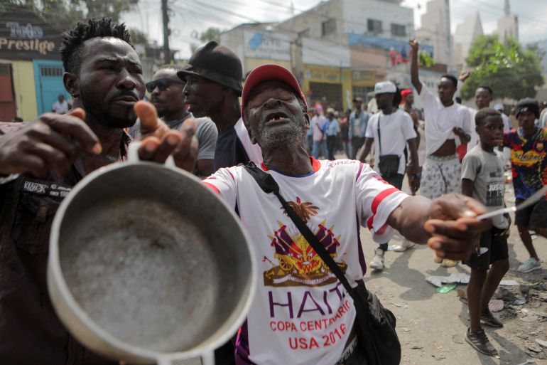 Haitians protest against the government and rising fuel prices, in Port-au-Prince