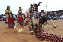 A spiritual healer from the Nuba Mountains tribe performs during a celebration of their cultural heritage in Omdurman