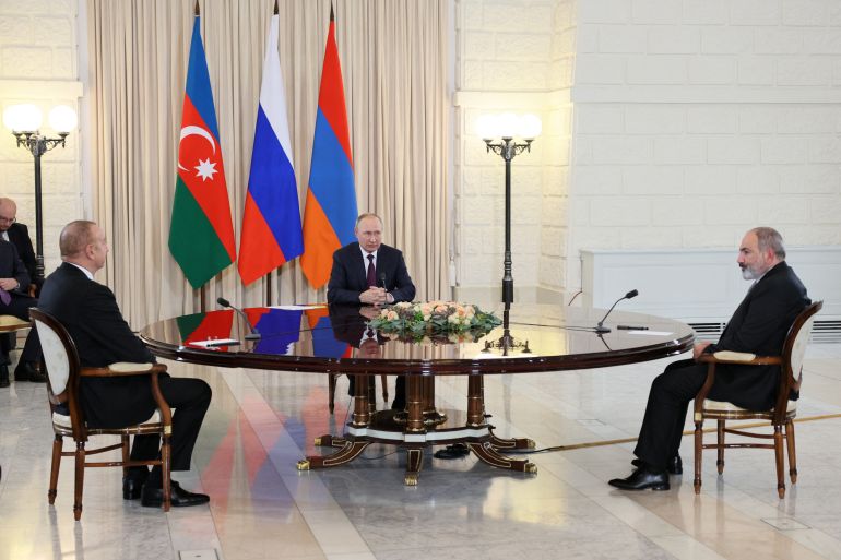 Russia's President Vladimir Putin, Armenia's Prime Minister Nikol Pashinyan and Azerbaijan's President Ilham Aliyev attend a trilateral meeting in Sochi, Russia October 31, 2022. Sputnik/Sergey Bobylev/Pool via REUTERS ATTENTION EDITORS - THIS IMAGE WAS PROVIDED BY A THIRD PARTY.