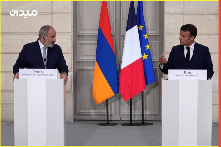 French President Emmanuel Macron and Armenian Prime Minister Nikol Pashinyan attend a joint press conference Monday, Sept. 26, 2022 at the Elysee Palace in Paris, France. Michel Euler/Pool via REUTERS