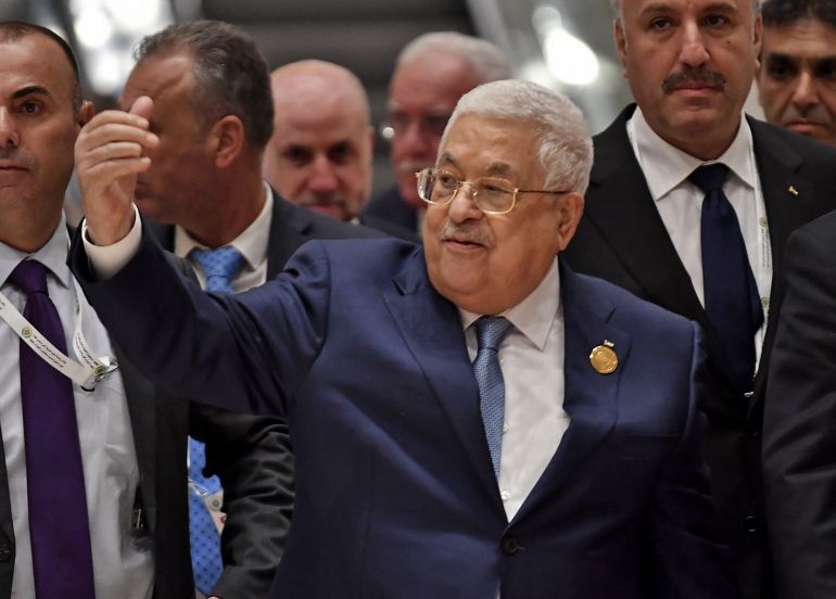 Palestinian President Mahmud Abbas leaves following the opening ceremony of the Arab summit in Algiers on November 1, 2022. - Arab leaders gathered in the Algerian capital for their first summit since a string of normalisation deals with Israel that have divided the region. (Photo by FETHI BELAID / AFP)