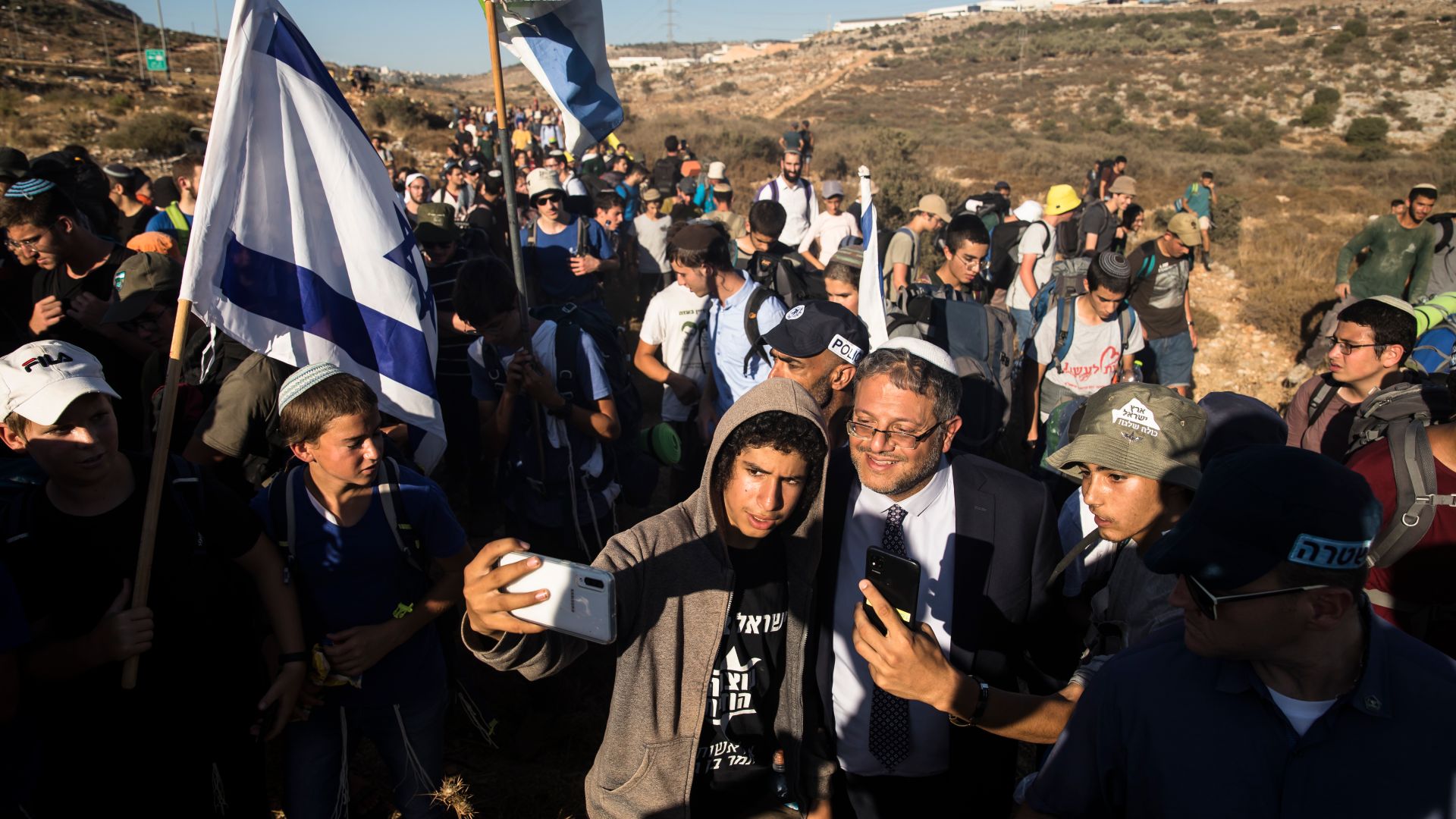 BARKAN, WEST BANK - JULY 20: Israeli right wing law maker, Itamar Ben Gvir pose for a photo as activists try to build a new illegal West Bank outpost near the settlement of Barkan on July 20, 2022 in Barkan, West Bank. Thousand of right wing actvists campout in several locations across the West Bank plan to establish new settlements despite army and police warning. (Photo by Amir Levy/Getty Images)Images)