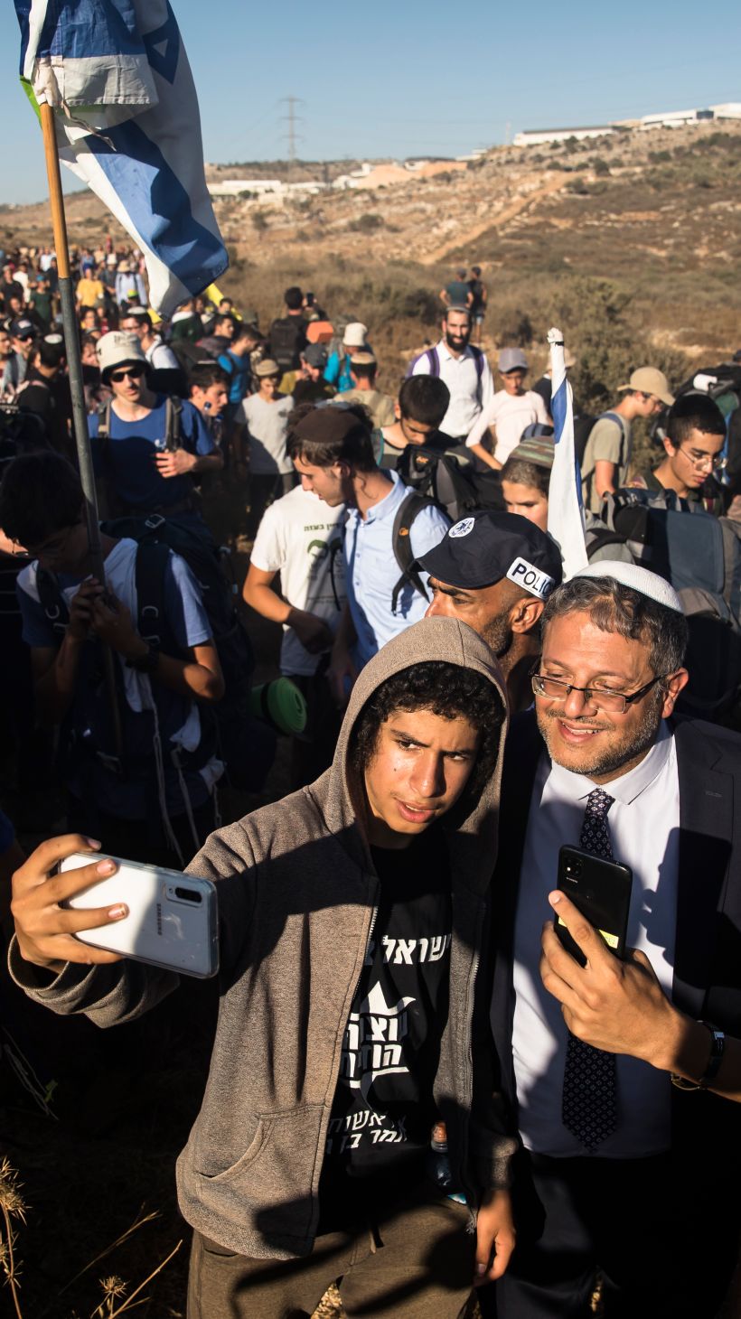 BARKAN, WEST BANK - JULY 20: Israeli right wing law maker, Itamar Ben Gvir pose for a photo as activists try to build a new illegal West Bank outpost near the settlement of Barkan on July 20, 2022 in Barkan, West Bank. Thousand of right wing actvists campout in several locations across the West Bank plan to establish new settlements despite army and police warning. (Photo by Amir Levy/Getty Images)Images)