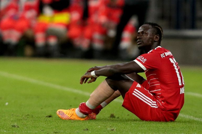 Sadio Mané on the ground after getting injured during the match against SV Werder Bremen. Photo by Harry Langer/DeFodi Images via Getty Images