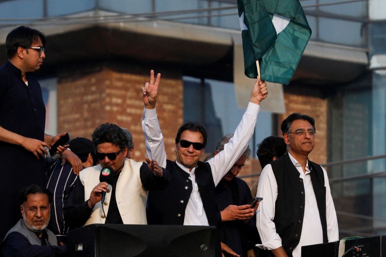 Pakistan's former prime minister Imran Khan leads a freedom march, to pressure the government to announce new elections, in Lahore