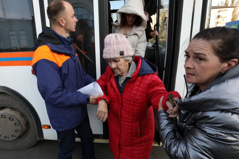 Civilians evacuated from the Russian-controlled Kherson region of Ukraine arrive in Dzhankoi