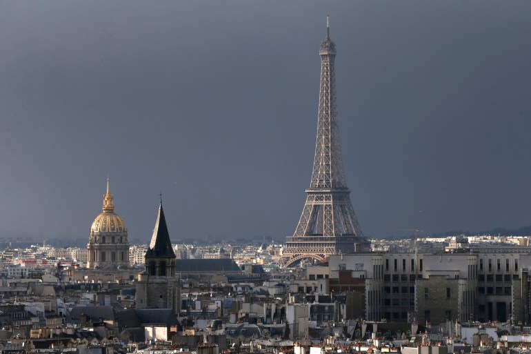 General view of the French capital with the Dome des Invalides (L), the Eglise Saint Germain des Pres (C) and the Eiffel Tower, in Paris, France, January 14, 2016. REUTERS/Charles Platiau