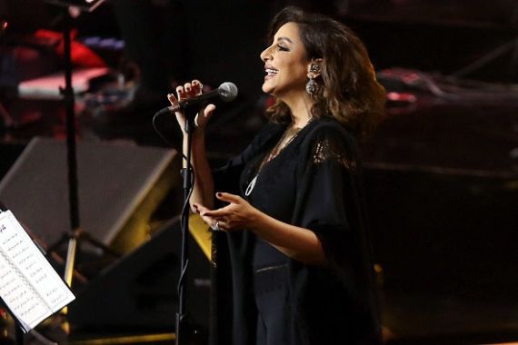 Egyptian singer Angham performs during the annual 'Hala February Festival' in Kuwait City, on March 11, 2022. (Photo by YASSER AL-ZAYYAT / AFP) (Photo by YASSER AL-ZAYYAT/AFP via Getty Images)