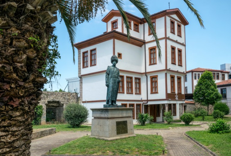 Trabzon, Turkey - June 10, 2021: Bronze statue of Sultan Suleiman the Magnificent, installed in the city park Kanuni in 1995 in the hometown of the Sultan of Trabzon, Turkey