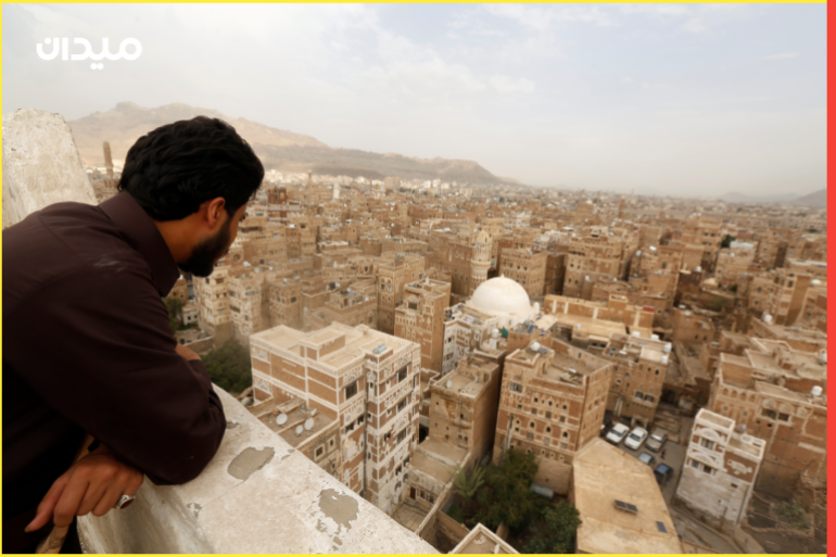 A man looks at the buildings in the old quarter of Sanaa, Yemen August 6, 2018. Picture taken August 6, 2018. REUTERS/Khaled Abdullah