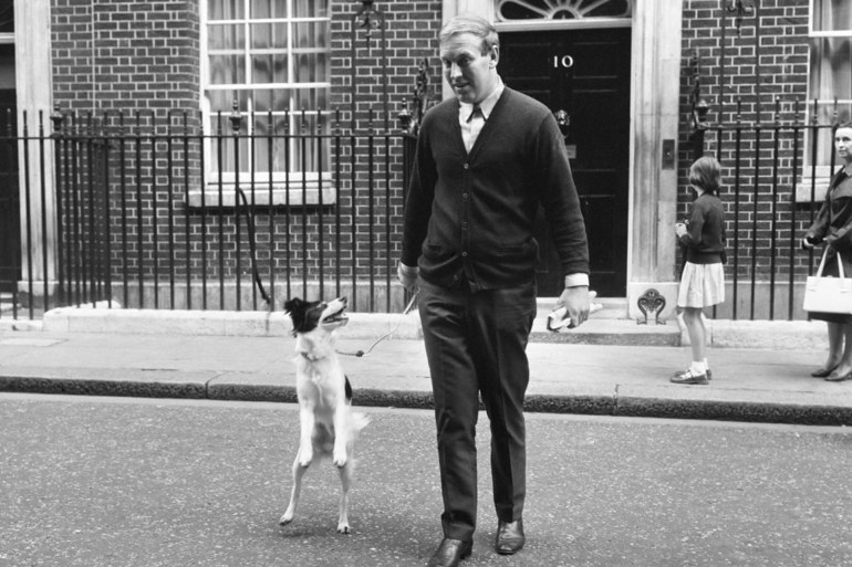Mr David Corbett and Pickles, the famous World Cup dog, on film location outside Number 10 Downing Street. Pickles stars with Eric Sykes and laurence harvey in the film 'The Spy With The Cold Nose', 31st July 1966. (Photo by Charlie Ley/Mirrorpix/Getty Images)