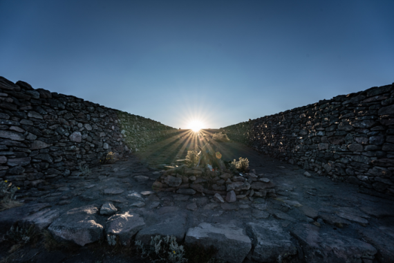 Rising sun viewed from the stone causeway of the solar observatory on Mount Tlaloc, Mexico. The view aligns with the rising sun on February 24, coinciding with the Mexica calendar's new year.