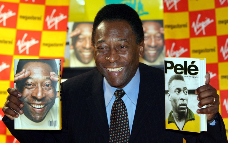 FILE PHOTO: Brazilian soccer legend Pele attends the launch of his book "Pele - The Autobiography" in central London, Britain, May 18, 2006. REUTERS/Toby Melville/File Photo