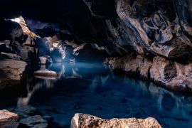 Iceland, Grjotagja cave with beautiful underground warm water pool