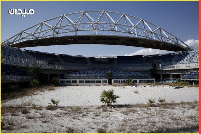 The abandoned stadium which hosted the beach volleyball competition during the Athens 2004 Olympic Games is seen at the Faliro complex south of Athens July 29, 2014. Ten years after Greece hosted the world's greatest sporting extravaganza, many of its once-gleaming Olympic venues have been abandoned while others are used occasionally for non-sporting events such as conferences and weddings. For many Greeks who swelled with pride at the time, the Olympics are now a source of anger as the country struggles through a six-year depression, record unemployment, homelessness and poverty. Just days before the anniversary of the Aug. 13-29 Games in 2004, many question how Greece, among the smallest countries to ever host the Games, has benefited from the multi-billion dollar event. Picture taken July 29, 2014. REUTERS/Yorgos Karahalis (GREECE - Tags: SOCIETY SPORT POLITICS BUSINESS) ATTENTION EDITORS: PICTURE 29 OF 33 FOR WIDER IMAGE PACKAGE 'TEN YEARS ON - ATHENS' FADING OLYMPIC STADIUMS' TO FIND ALL IMAGES SEARCH 'BEHRAKIS KARAHALIS'