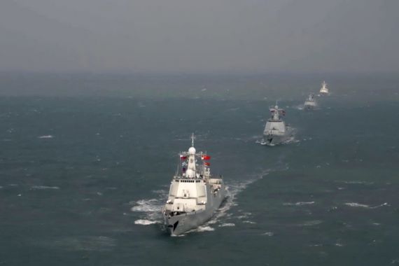 Ships sail in formation during the Russia-China naval exercise "Maritime Interaction-2022" in the East China Sea, in this still image taken from video released December 28, 2022. Russian Defence Ministry/Handout via REUTERS ATTENTION EDITORS - THIS IMAGE WAS PROVIDED BY A THIRD PARTY. NO RESALES. NO ARCHIVES. MANDATORY CREDIT. 2022-12-28T082947Z_67860940_RC2WEY95C7Z8_RTRMADP_3_RUSSIA-CHINA