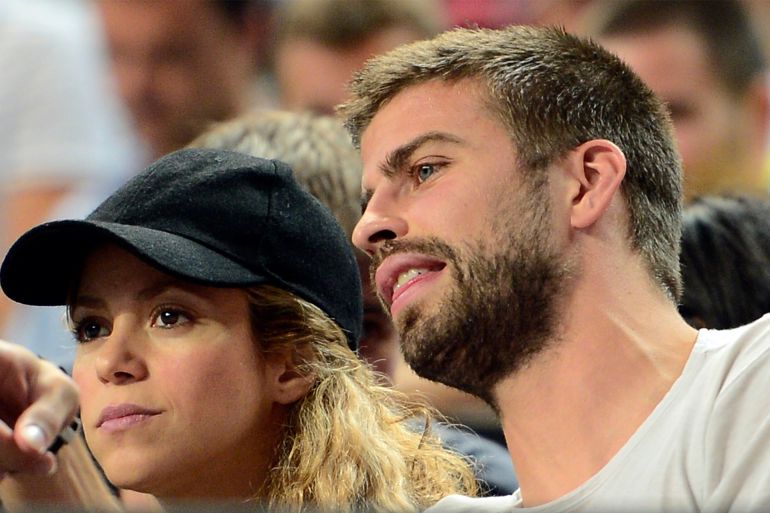 Spain Basketball World Cup FC Barcelona's player Gerard Pique, right, and Colombian singer Shakira attend a Basketball World Cup quarterfinal match between Slovenia and United States at the Palau Sant Jordi in Barcelona, Spain, Tuesday, Sept. 9, 2014. The 2014 Basketball World Cup competition will take place in various cities in Spain from Aug. 30 through to Sept. 14. (AP Photo/Manu Fernandez)