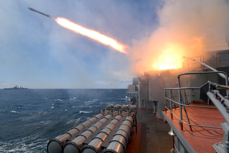 An anti-submarine missile blasts off from the Russian warship 