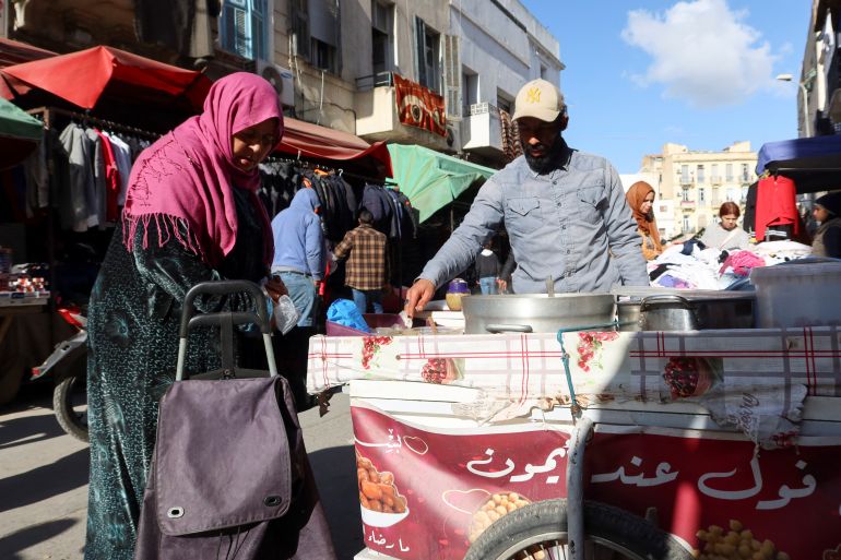 People shop at Sidi Bahri marketplace in downtown Tunis
