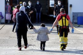 Dungeness, Kent, UK, May 5th 2022, Migrant families with children arrive on Kent beach at Dungeness after being rescued at sea crossing the English channel by RNLI and Border Force.