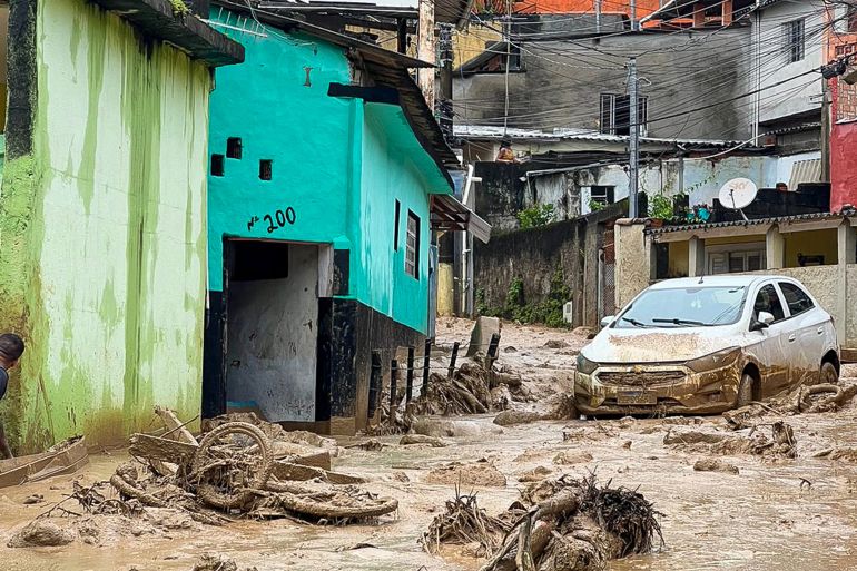This handout picture released by Sao Sebastiao City Hall shows the damage caused by heavy rains in the municipality of Sao Sebastiao, north coast of the state of Sao Paulo, Brazil, on February 19, 2023. A strong storm with a "record" amount of rain caused at least 19 deaths from floods and landslides during the carnival weekend in several towns in the state of Sao Paulo, authorities reported on Sunday. (Photo by Sao Sebastiao City Hall / AFP) / RESTRICTED TO EDITORIAL USE - MANDATORY CREDIT "AFP PHOTO / SAO SEBASTIAO CITY HALL / DANIELA ANDRADE" - NO MARKETING NO ADVERTISING CAMPAIGNS - DISTRIBUTED AS A SERVICE TO CLIENTS - RESTRICTED TO EDITORIAL USE - MANDATORY CREDIT "AFP PHOTO / SAO SEBASTIAO CITY HALL / DANIELA ANDRADE" - NO MARKETING NO ADVERTISING CAMPAIGNS - DISTRIBUTED AS A SERVICE TO CLIENTS