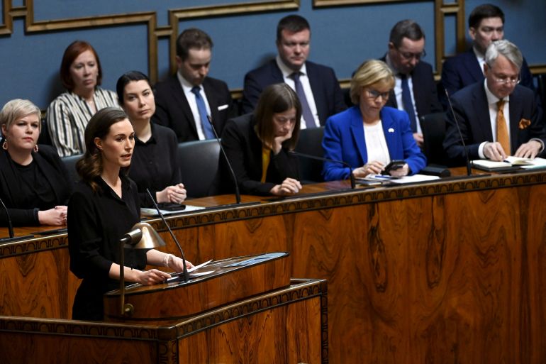 Finland's Prime Minister Sanna Marin speaks during the plenary session at the Finnish parliament in Helsinki