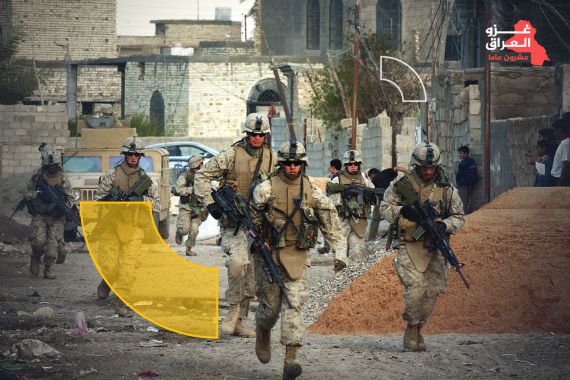 RAMADI, IRAQ - MARCH 19: U.S. Marines from the 1st Battalion 5th Regiment, Bravo Company, patrol a street on March 19, 2005 in Ramadi, Iraq . Nearly two months after Iraq's historic elections, U.S and Iraqi Security Forces are still fighting the insurgents as the conflict moved into its second year. Meanwhile, the Iraqi National Assembly are still attempting to form a new government, inclusive of the Sunni minority. (Photo by Marco Di Lauro/Getty Images)
