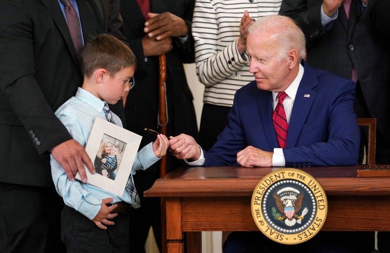 President Biden signs into law veteran care bills at the White House in Washington