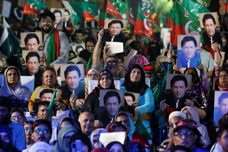 People gather during a countrywide protest, called by ousted Prime Minister Imran Khan, on inflation, in Karachi