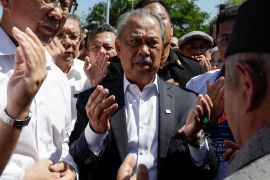 Former Malaysia Prime Minister Muhyiddin Yassin arrives to give a statement to the Malaysian Anti-Corruption Commission (MACC) in Putrajaya