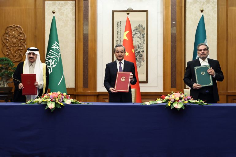 China's director of the Office of the Central Foreign Affairs Commission Wang Yi, Ali Shamkhani, the secretary of Iran’s Supreme National Security Council and Saudi national security adviser Musaad bin Mohammed Al Aiban meet in Beijing