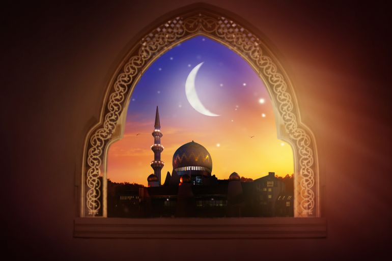 Ramadan Kareem greeting. Islamic city with mosque skyline, crescent moon and stars. View from a window. End of fasting. Hari Raya card. Eid al-Fitr. Breaking of holy fast day. Muslim holiday. SS2141316381